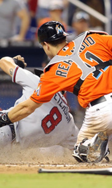 Braves complete sweep by beating Marlins 6-5 in 10 innings